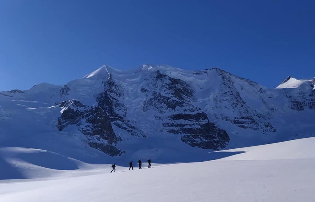 Ski tourers in front of Piz Palü