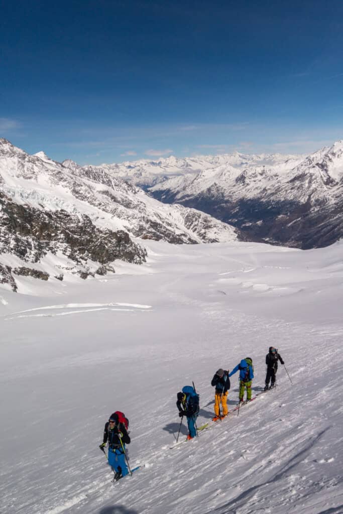 Ski tourers ascending the glacier