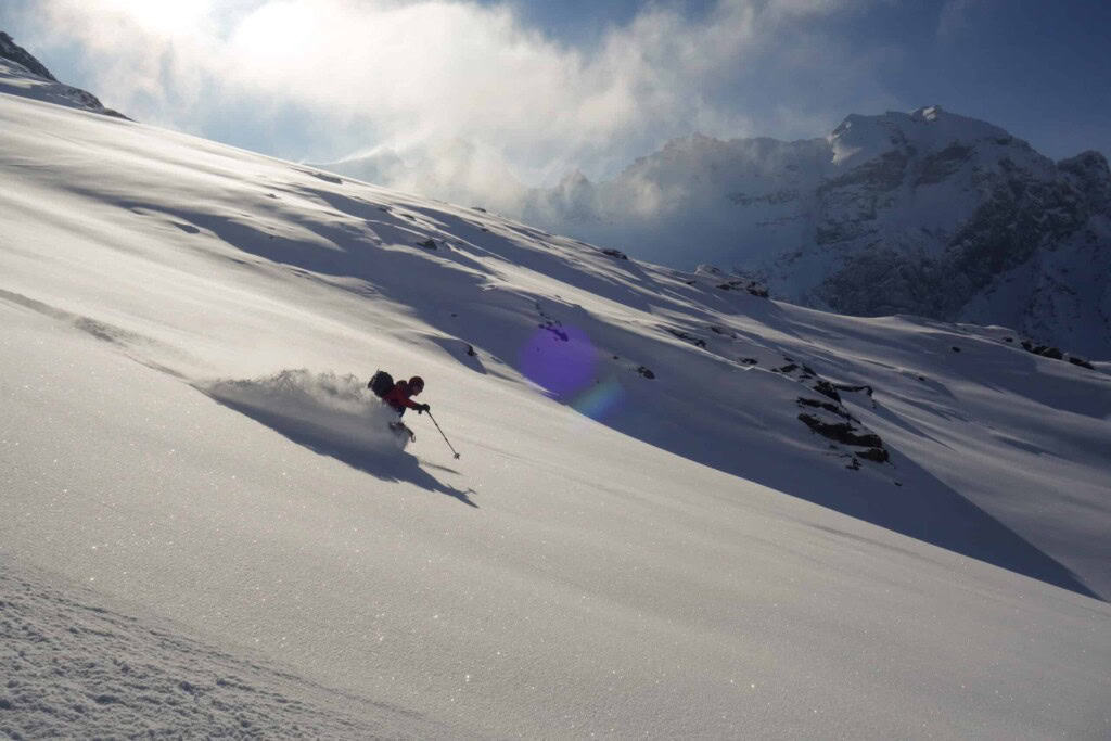 Powder descent on skis on Mont Velan